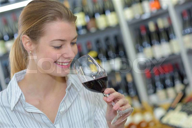 Happy to smell the wine, stock photo