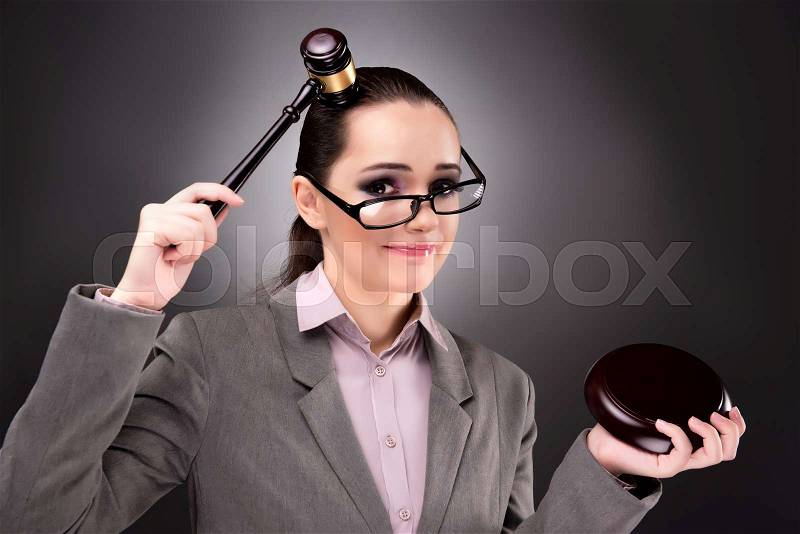 Woman judge with gavel in justice concept, stock photo