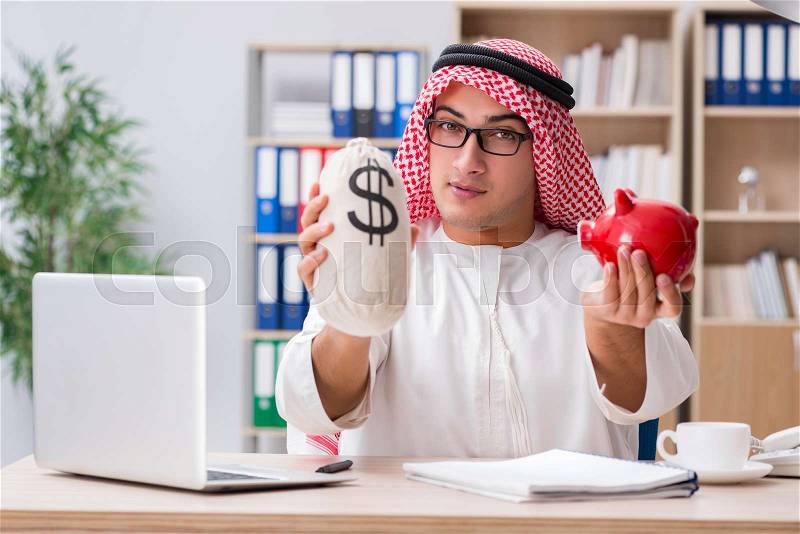 Arab businessman working in the office, stock photo