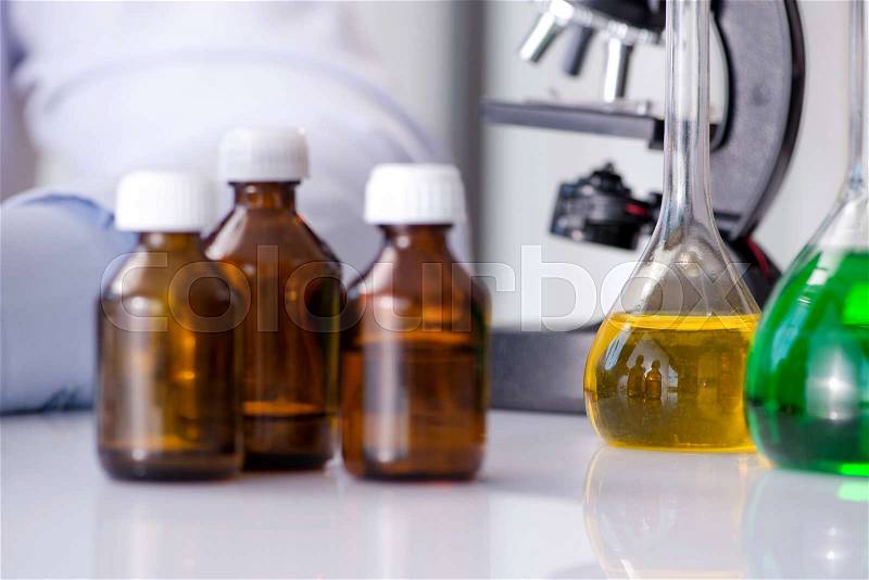 Chemical bottles in the lab, stock photo