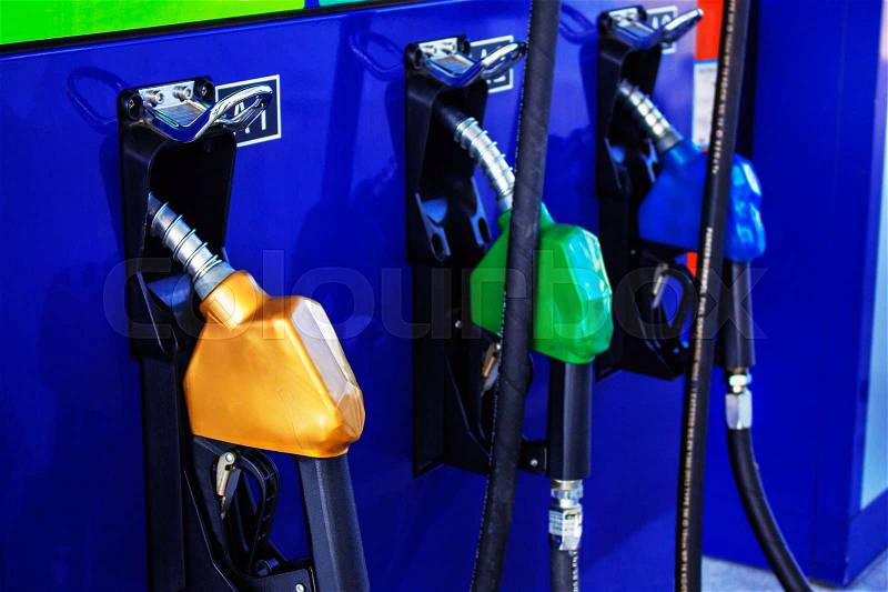 Fuel nozzle in the gas station in thailand, stock photo