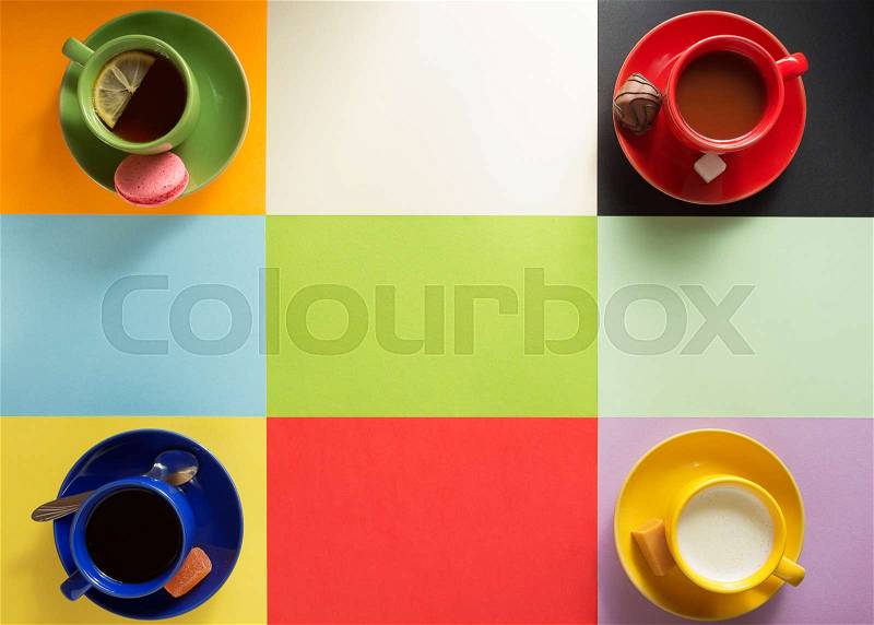 Cup of coffee, tea and cacao at paper colorful background, stock photo