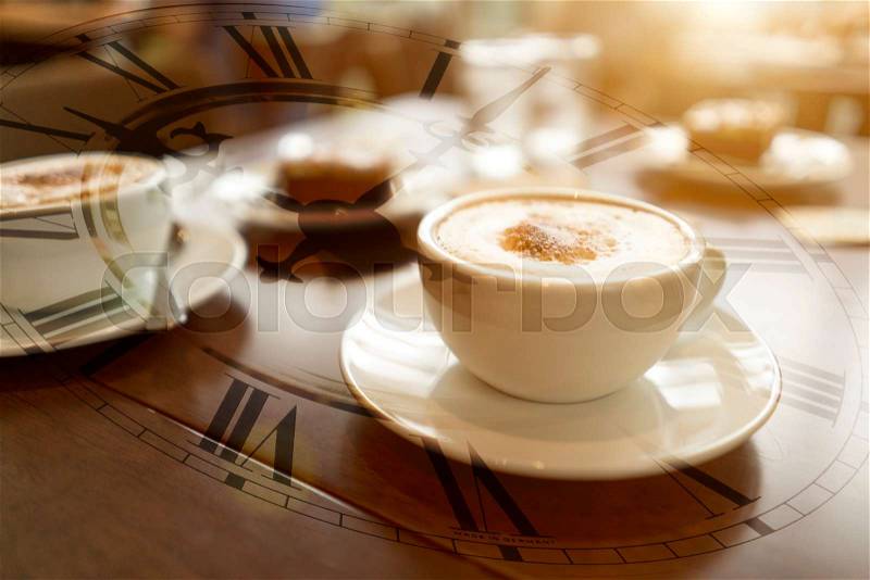 Double exposure of coffee cup with clock face, stock photo