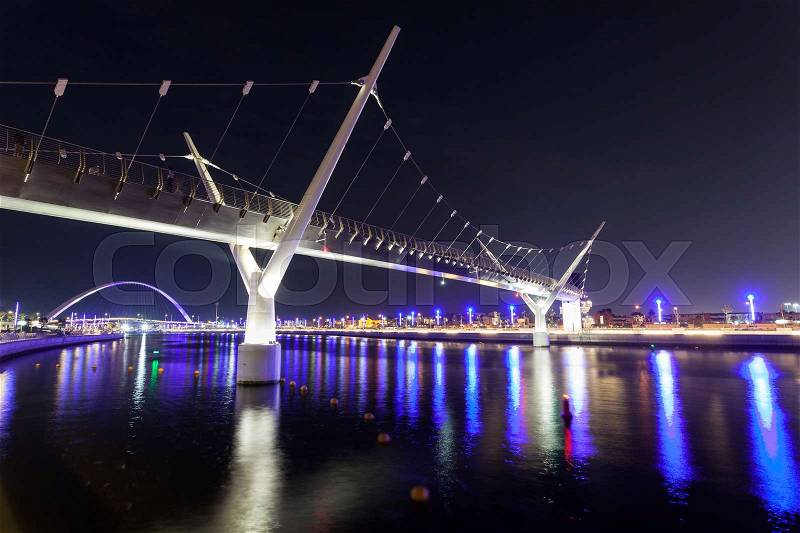 New bridge over the Dubai Water Canal at night. United Arab Emirates, Middle East, stock photo
