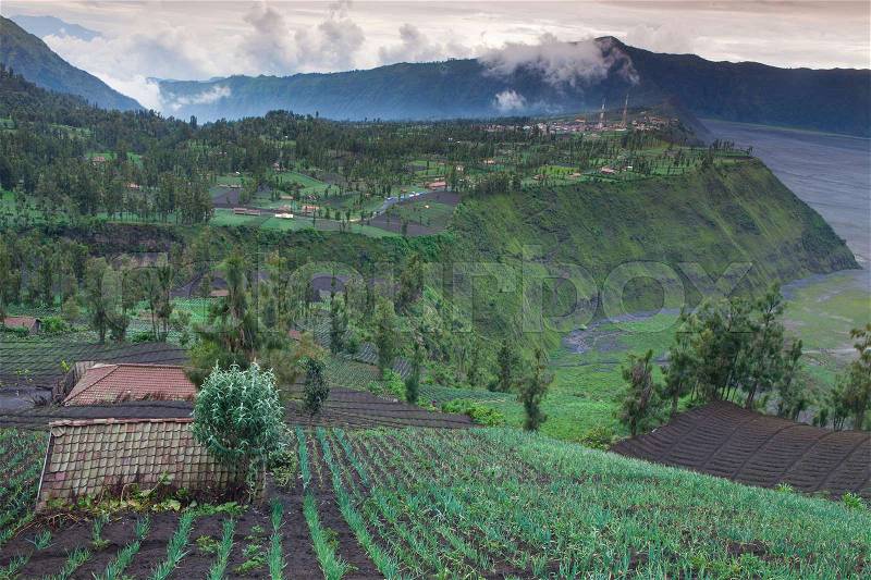 Landscape with village on mountains, Indonesia, stock photo