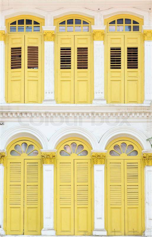 White building and wellow windows from singapore china town, stock photo