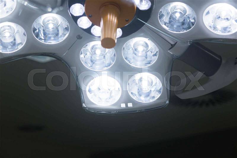 Operating emergency room surgery theater lighting in hospital to enable surgeon to see well in operations, stock photo