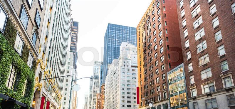 Morning in the urban quarter. Different tall buildings around, stock photo