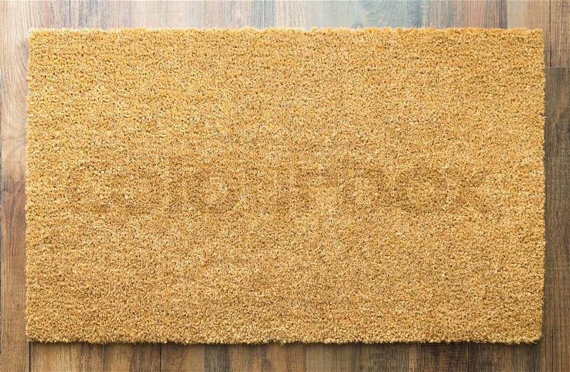 Blank Welcome Mat On Wood Floor Background Ready For Your Own Text, stock photo