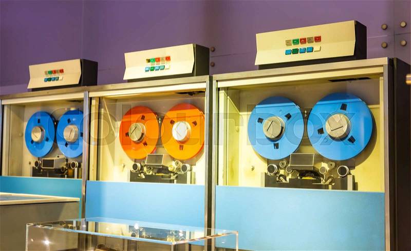 Retro calculating machine drives with magnetic tape in computer museum in USA, stock photo