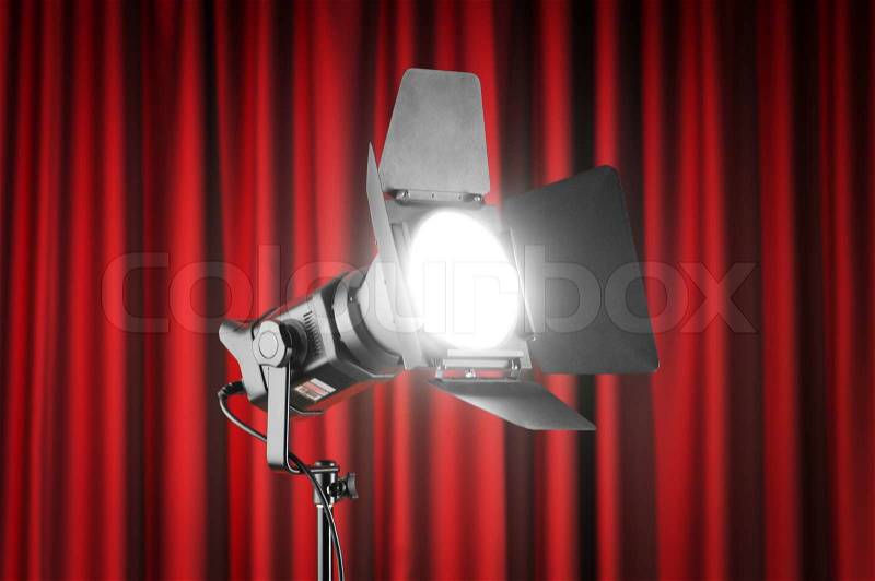 Curtains and projector lights wtih space for your text, stock photo