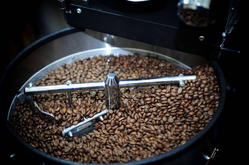Machine for roasting coffee close up , stock photo