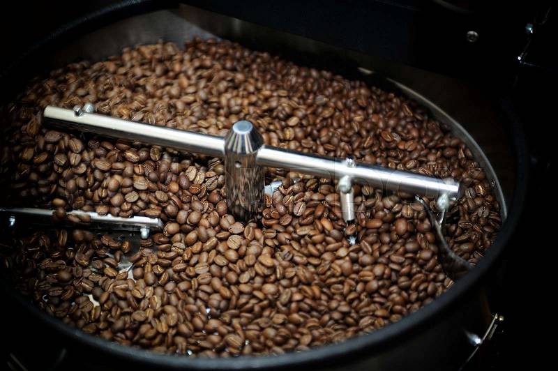 Machine for roasting coffee close up , stock photo