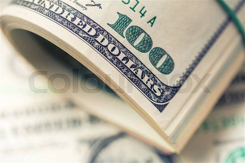 Dollars rolled closeup. American Dollars Cash Money. One Hundred Dollar Banknotes, stock photo