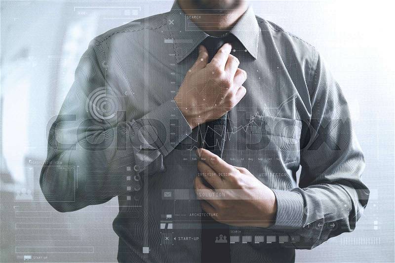 Businessman adjusting tie,Front view, no head. Concept of working in an office.business strategy icons interface, stock photo