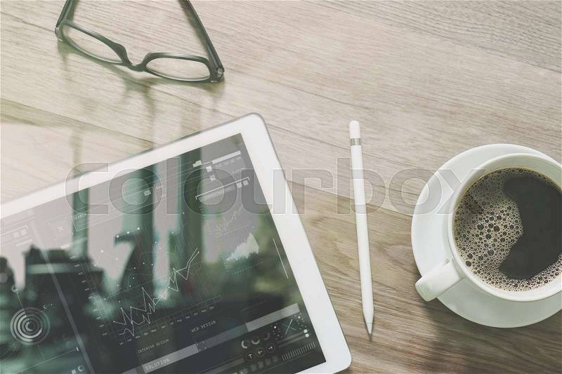 Coffee cup and Digital table dock smart keyboard,eyeglasses,stylus pen on wooden table,filter effect,icons screen, stock photo