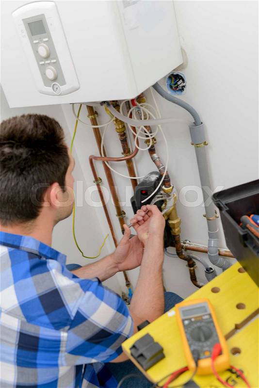 Repairing a boiler is expensive, stock photo