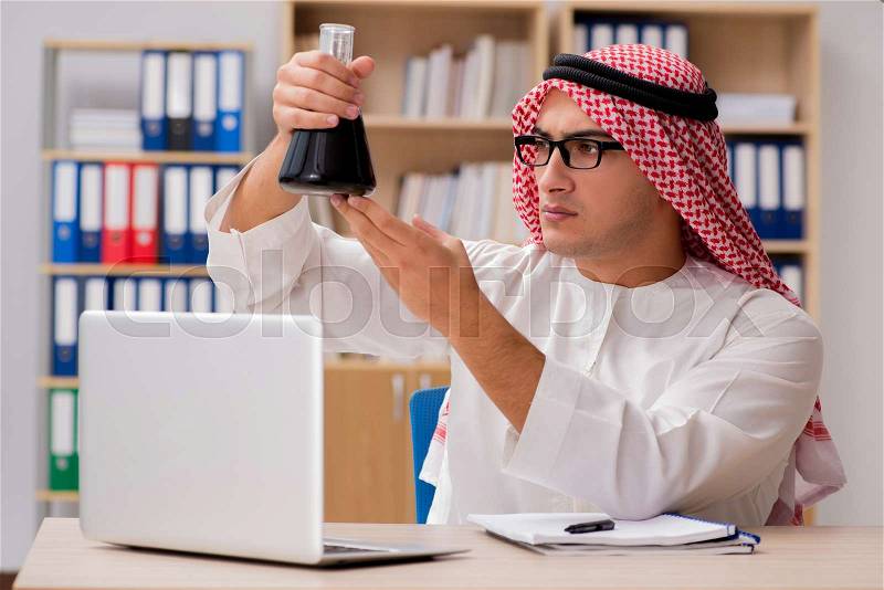 Arab businessman working in the office, stock photo