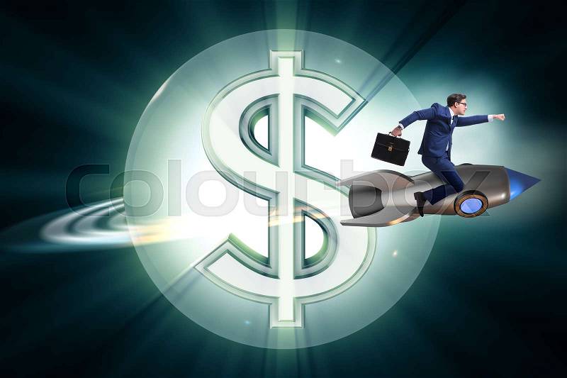 Businessman on rocket flying around dollar, stock photo