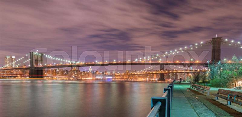 Night view of Manhattan and Brooklyn bridge, stock photo