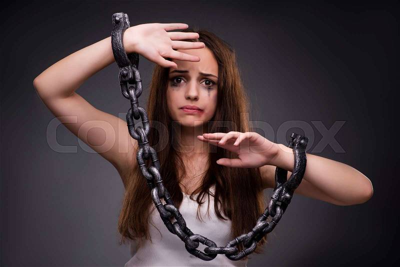 Woman in violence and discrimination concept, stock photo