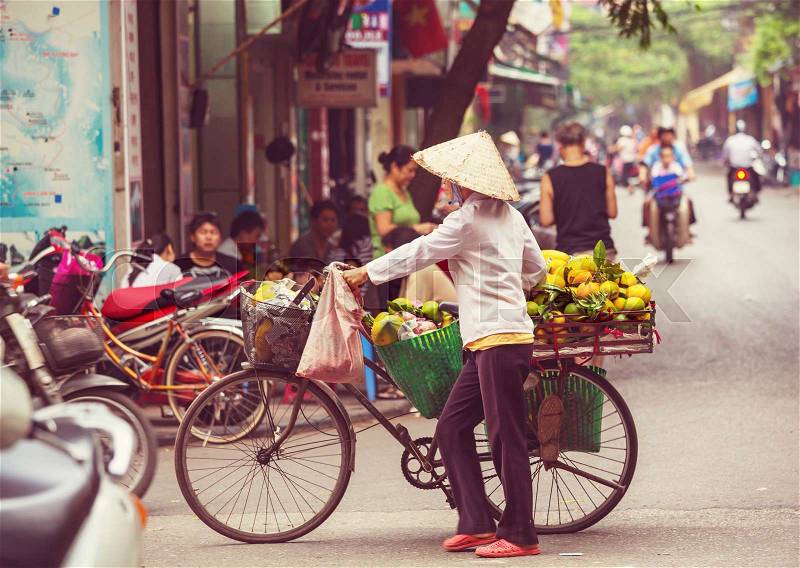 Vietnamese street vendor, stock photo