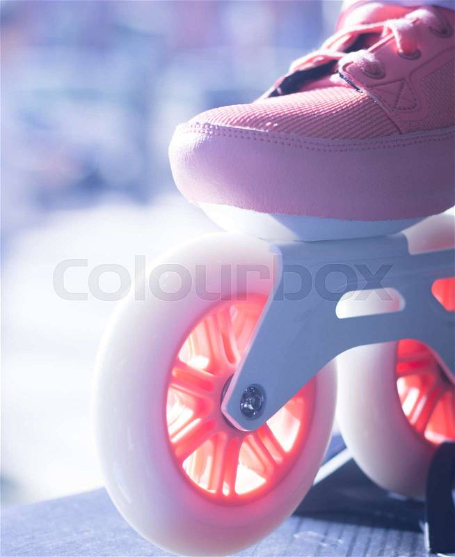 Inline freestyle new roller skates in retail skate shop window display on sale, stock photo