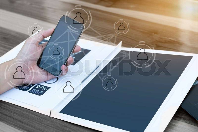 Business technology concept,Business people hands use smart phone and laptop for business analyst project on table with social network icon symbol,selective focus, stock photo