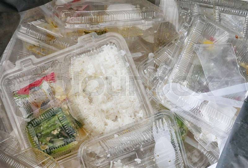Foam and plastic food container in the bin / environmental problems, stock photo