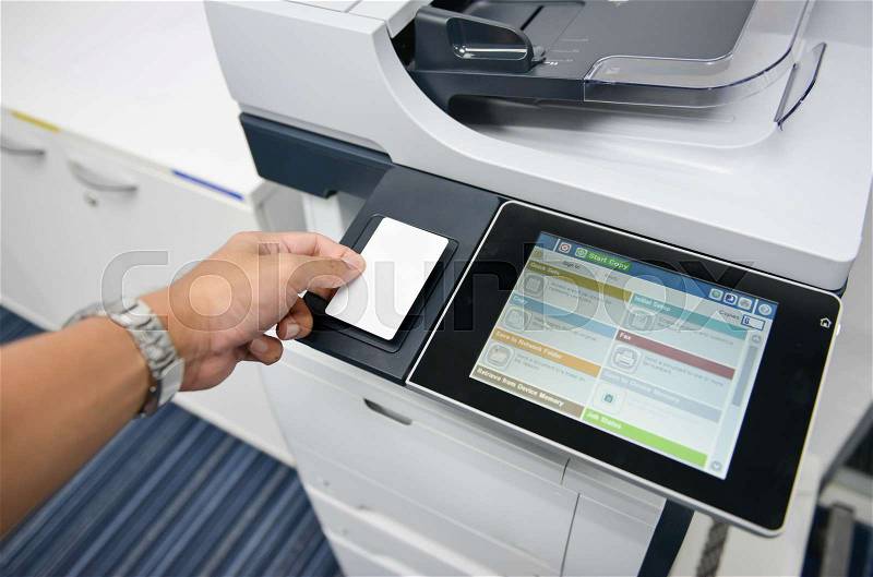 Using the access card on printer to printing the document, stock photo