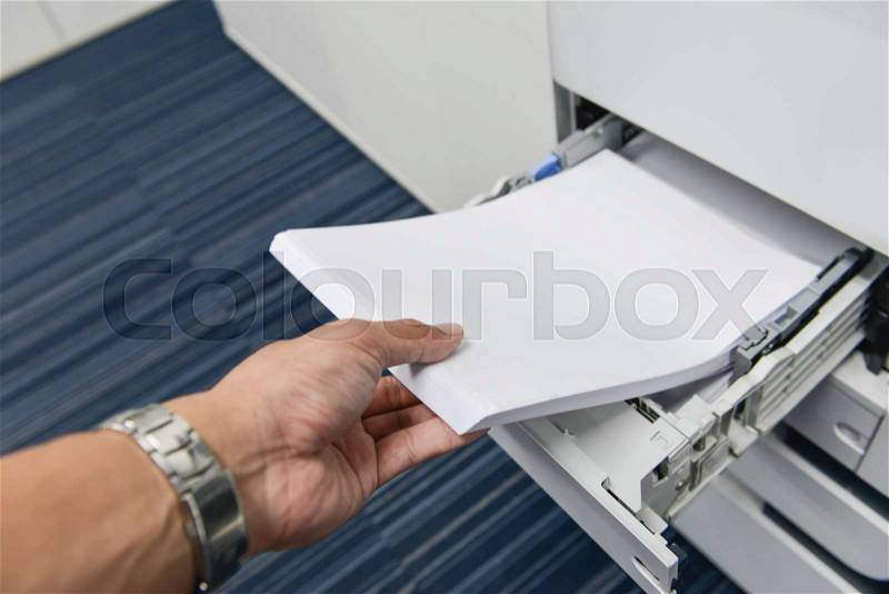 Reload paper to printer tray, stock photo
