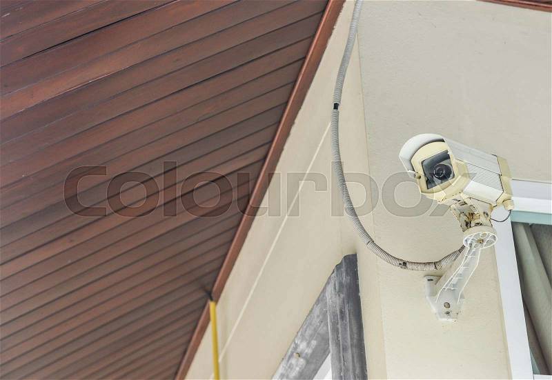 Closed-circuit camera (CCTV) installed for security at home, stock photo