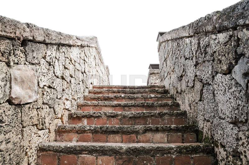 Ancient stone stairway goes up isolated on white background, stock photo