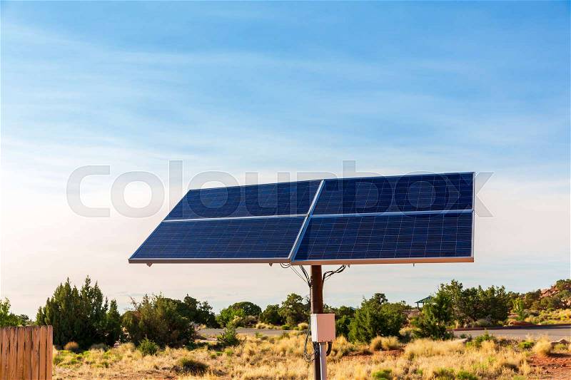 Blue solar panels against blue sky. Alternative energy technology, stock photo