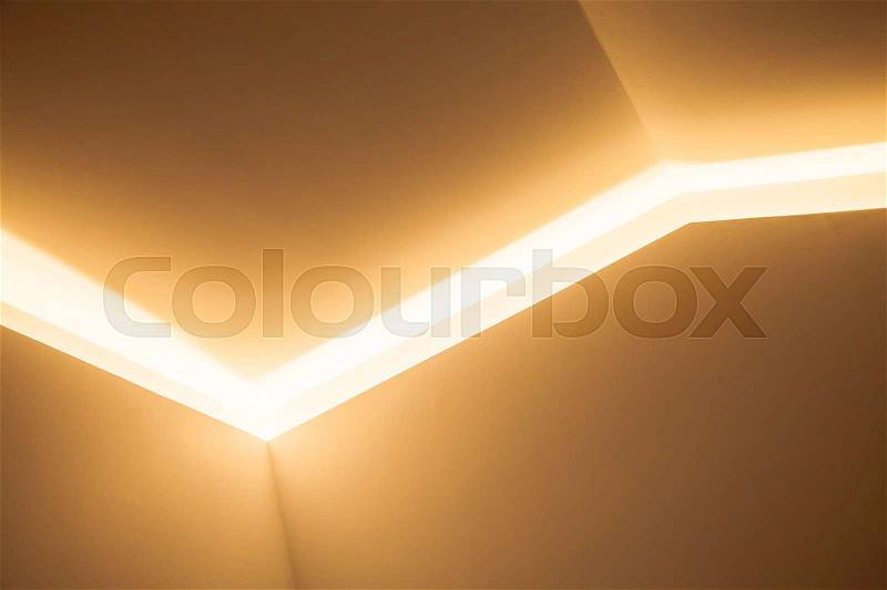 Abstract contemporary architecture background, decorative niches with bright inner LED illumination, stock photo