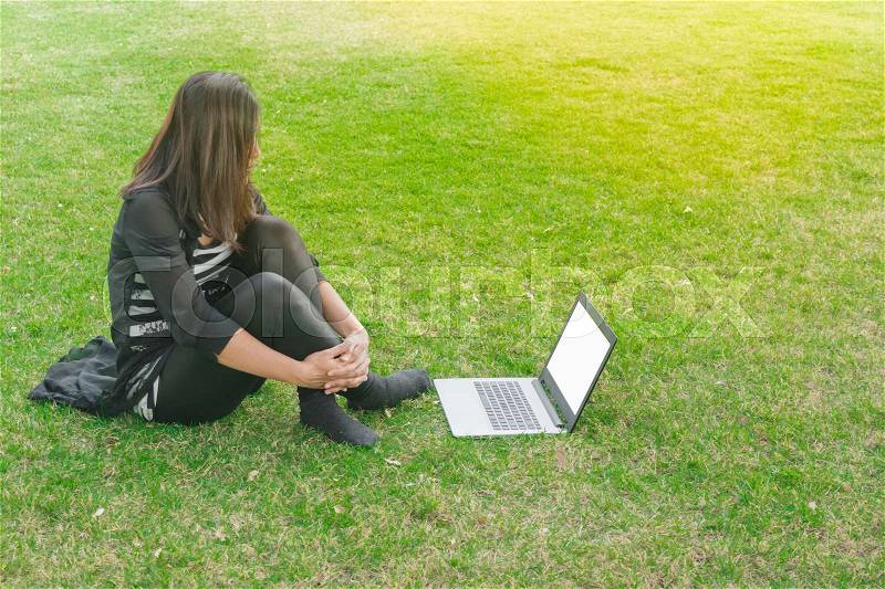 Beautiful asian woman working project analysis plans with generic design laptop. Smart work process concept, stock photo