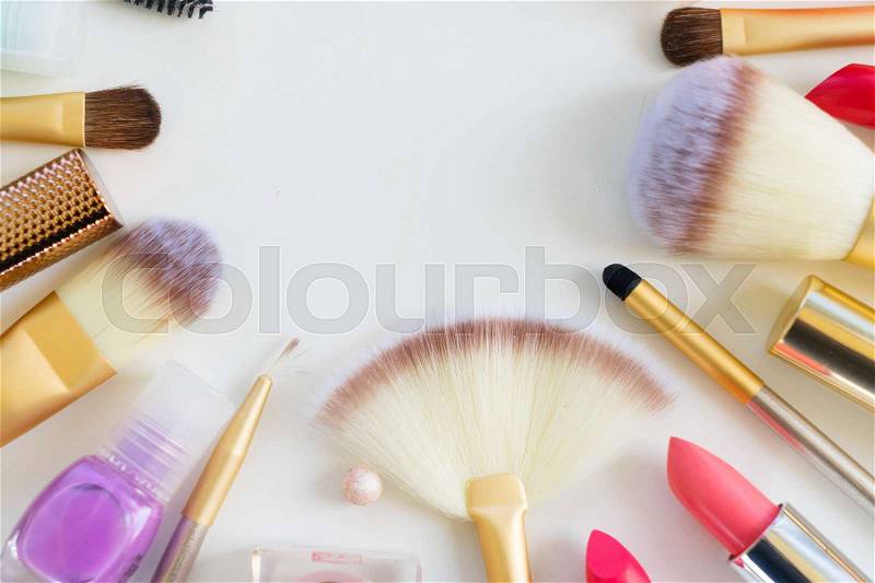 Colorful make up and brushes flat lay scene close up, stock photo