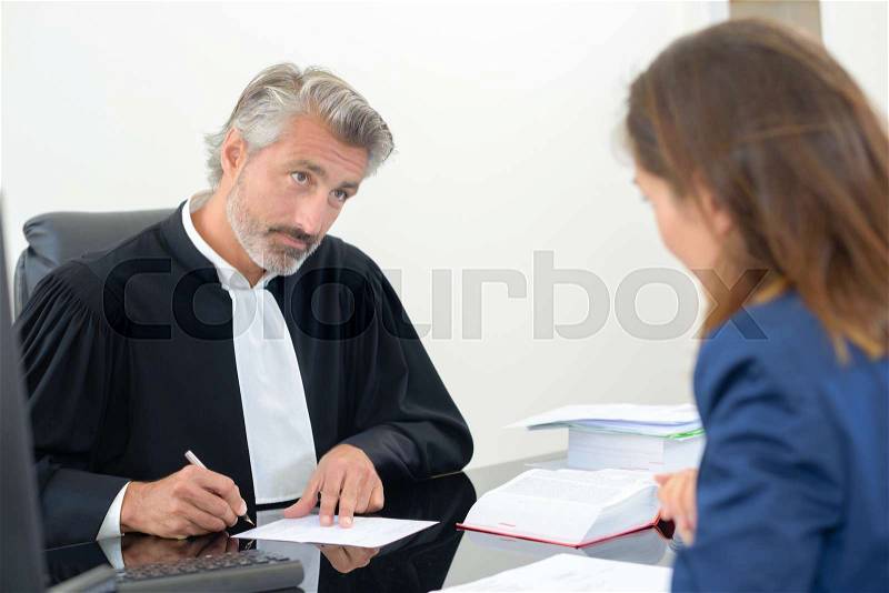 Law staff with a client, stock photo