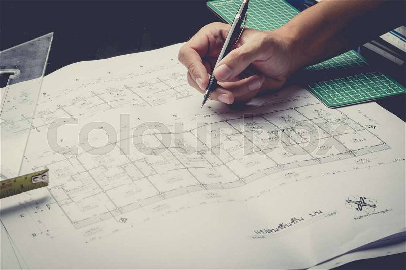 Engineering diagram blueprint paper drafting project sketch architectural,selective focus,vintage filter, stock photo