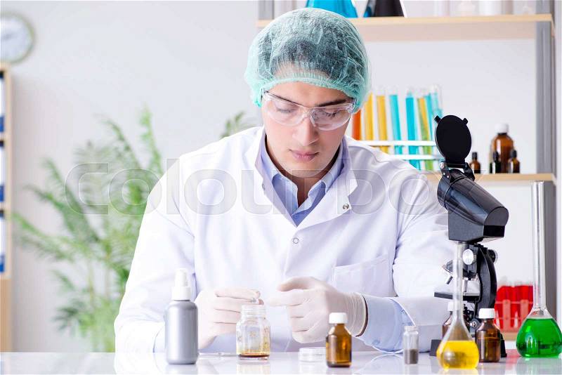 Pharmaceutical industry concept with scientist in the lab, stock photo