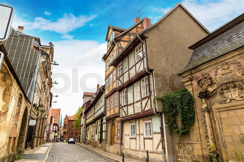 Historic houses in Quedlinburg in a beautiful summer day, Germany, stock photo