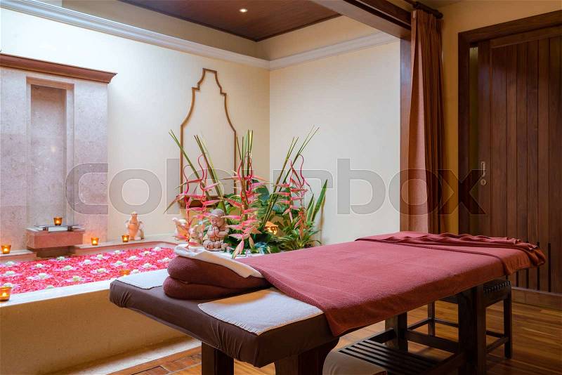 Spa room with bed for treatment, stock photo
