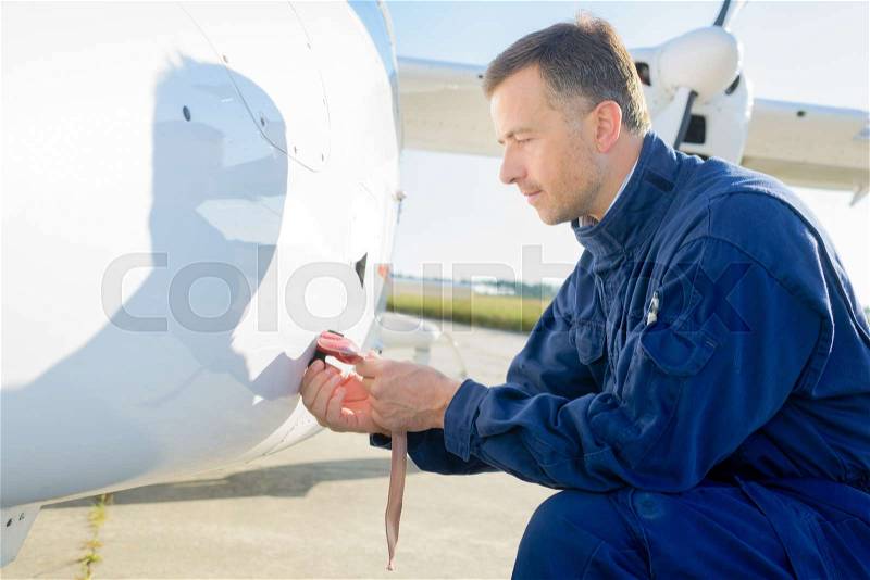 Airplane maintenance engineer, stock photo