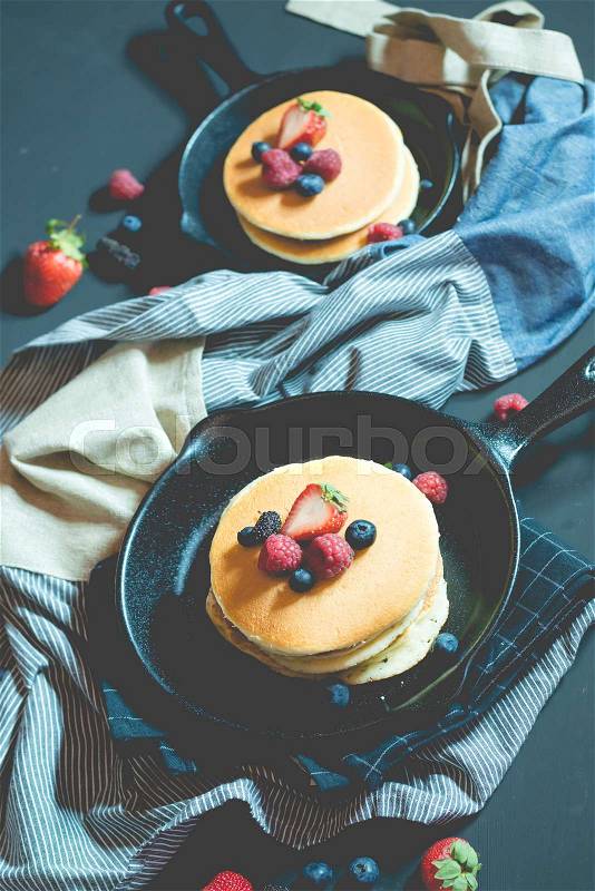 Pancake with fresh fruit and berry stack on pan for breakfast bakery,selective focus, stock photo
