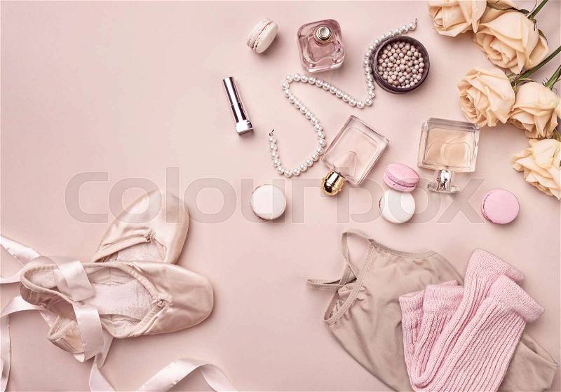 Vintage still Life with roses anf pink Ballet Shoes on pink background, stock photo