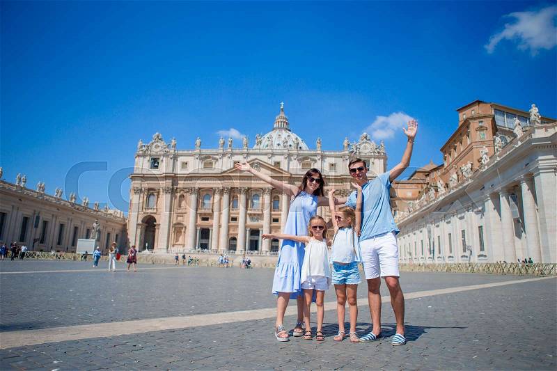 Happy family at St. Peter\'s Basilica church in Vatican city. Travel parents and kids on european vacation in Italy, stock photo