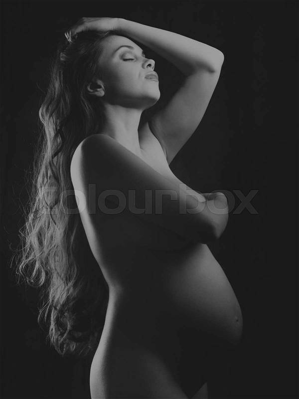 Pregnant woman. retro style black and white female portrait, stock photo