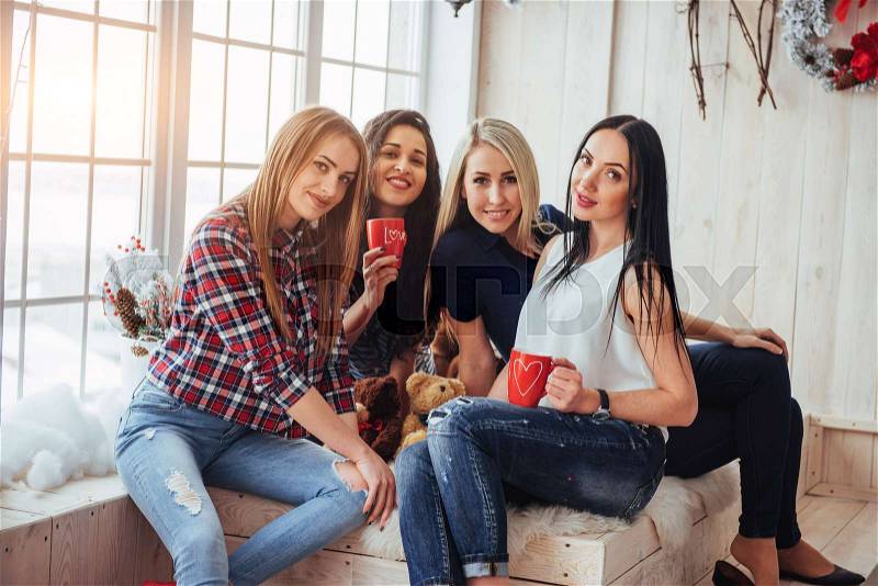 Group beautiful young people enjoying in conversation and drinking coffee, best friends girls together having fun, posing emotional lifestyle people concept, stock photo