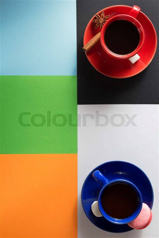 Cup of coffee and cacao at abstract colorful background, stock photo