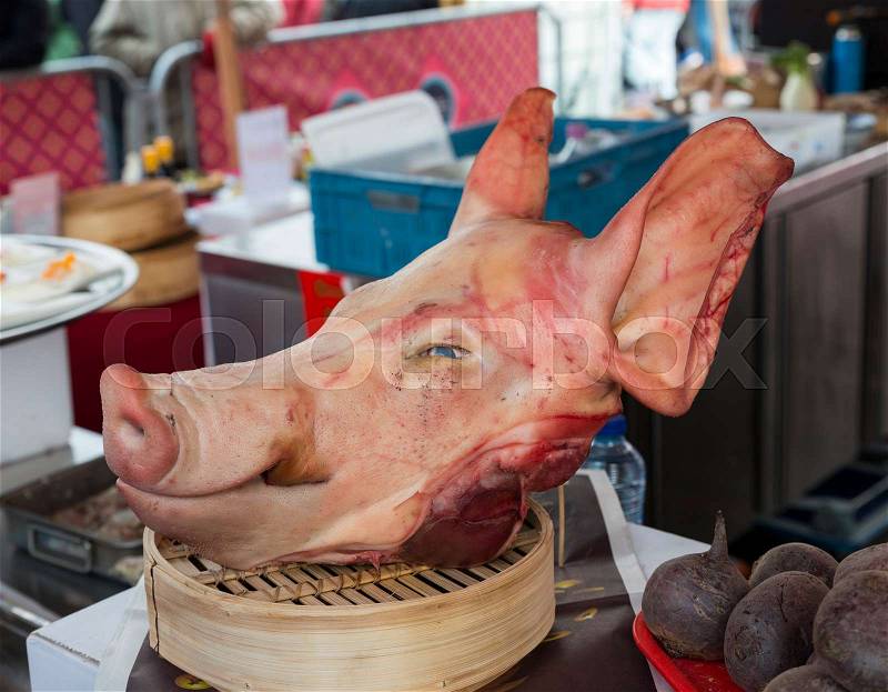 Pig head on chinese new year food market in Rotterdam, stock photo